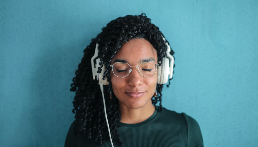 Smiling woman wearing headphones